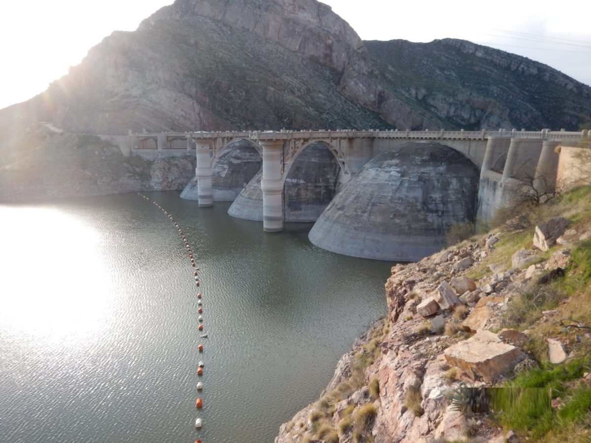 Coolidge Dam with San Carlos Reservoir at low water levels — the bathtub ring tells the story