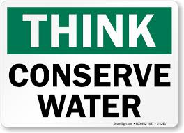 Think Conserve Water sign — the reality of Level 5WE water emergency in Kearny AZ